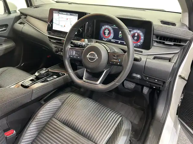 日産 オーラ G レザーエディション 愛媛県 2023(令5)年 1.4万km ピュアホワイトパール メーカーナビ/(Bluetooth/HDMI)/プロパイロット/インテリジェントルームミラー/全周囲カメラ/BOSEサウンド/ワイヤレス充電/ステアリングヒーター/シートヒーター/純正ドライブレコーダー/ETC2.0/衝突被害軽減ブレーキ/コーナーセンサー/ブラインドスポットモニター/オートマチックハイビーム/オートライト/フォグランプ/スペアキー/保証書