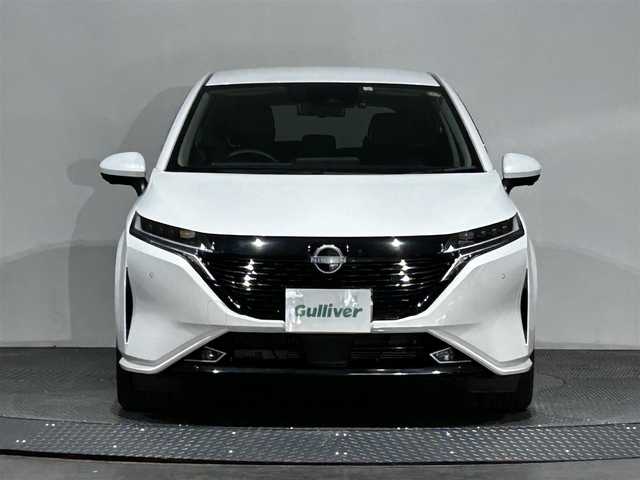 日産 オーラ G レザーエディション 愛媛県 2023(令5)年 1.4万km ピュアホワイトパール メーカーナビ/(Bluetooth/HDMI)/プロパイロット/インテリジェントルームミラー/全周囲カメラ/BOSEサウンド/ワイヤレス充電/ステアリングヒーター/シートヒーター/純正ドライブレコーダー/ETC2.0/衝突被害軽減ブレーキ/コーナーセンサー/ブラインドスポットモニター/オートマチックハイビーム/オートライト/フォグランプ/スペアキー/保証書