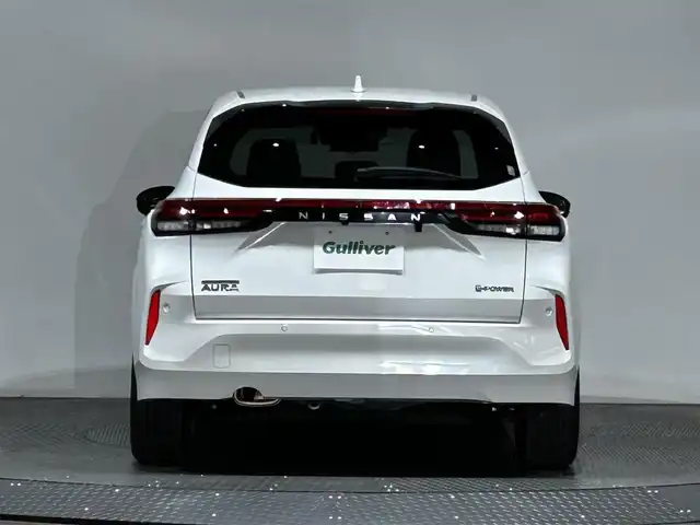 日産 オーラ G レザーエディション 愛媛県 2023(令5)年 1.4万km ピュアホワイトパール メーカーナビ/(Bluetooth/HDMI)/プロパイロット/インテリジェントルームミラー/全周囲カメラ/BOSEサウンド/ワイヤレス充電/ステアリングヒーター/シートヒーター/純正ドライブレコーダー/ETC2.0/衝突被害軽減ブレーキ/コーナーセンサー/ブラインドスポットモニター/オートマチックハイビーム/オートライト/フォグランプ/スペアキー/保証書