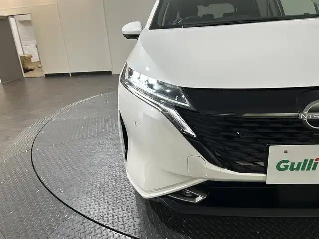 日産 オーラ G レザーエディション 愛媛県 2023(令5)年 1.4万km ピュアホワイトパール メーカーナビ/(Bluetooth/HDMI)/プロパイロット/インテリジェントルームミラー/全周囲カメラ/BOSEサウンド/ワイヤレス充電/ステアリングヒーター/シートヒーター/純正ドライブレコーダー/ETC2.0/衝突被害軽減ブレーキ/コーナーセンサー/ブラインドスポットモニター/オートマチックハイビーム/オートライト/フォグランプ/スペアキー/保証書