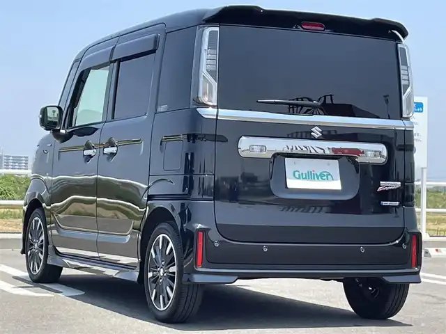 スズキ スペーシア カスタム HYBRID XS ターボ 佐賀県 2023(令5)年 1.2万km ブルーイッシュブラックパール3 純正８型ナビ/フルセグTV/全周囲カメラ/レーダークルーズコントロール/両側パワースライドドア/ヘッドアップディスプレイ/セーフティーサポート/・車線逸脱警報機能/・ふらつき警報機能/・急ブレーキ時シグナル/・デュアルセンサーブレーキサポート/USBポート/ビルトインETC/パドルシフト/プッシュスタート/スマートキー/純正LEDヘッドライト/純正15インチアルミ/純正フロアマット