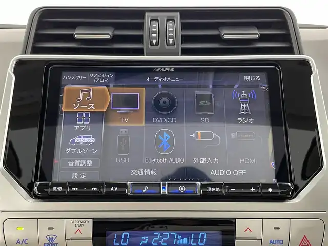 トヨタ ランドクルーザー プラド TX Lパッケージ マットブラED 大分県 2023(令5)年 4.9万km ブラック 7人乗り/サンルーフ/寒冷地仕様/Toyota Safety Sense/・プリクラッシュセーフティ/・レーンディパーチャーアラート/（ヨーアシスト機能付）/・オートマチックハイビーム/・レーダークルーズコントロール（ブレーキ制御付）/・ロードサインアシスト/パーキングサポートブレーキ（前後方静止物）/社外9型ナビ　型式：X9NX/【フルセグTV、DVD再生可、BT対応、HDMI】/ステアリングスイッチ/バックカメラ/社外フリップダウンモニター/ビルトインETC/社外ドライブレコーダー（前後）/ベージュ革シート/・前席パワーシート/・前席シートヒーター/前席ベンチレーション/純正フロアマット/オートライト/LEDヘッドライト/LEDフォグ/クリアランスソナー/純正18インチアルミホイール/保証書