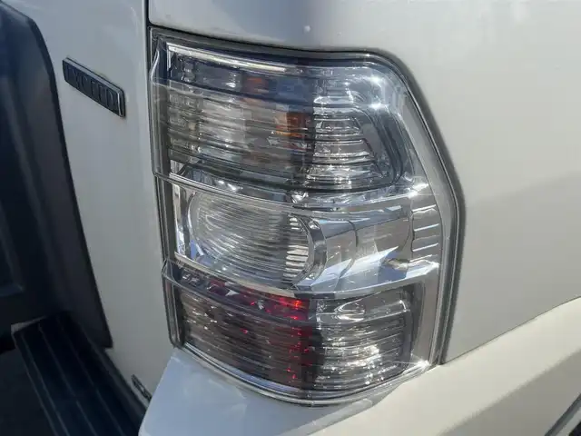 三菱 パジェロ ロング エクシード 秋田県 2012(平24)年 13.4万km ウォームホワイトパール ４WD/ターボ/社外メモリナビ/フルセグ/バックカメラ/社外17インチアルミ（夏タイヤ装着）/MTモード付AT/クルーズコントロール追従走行無/ステアリングスイッチ/前席シートヒーター/センターデフロック/ビルトインETC/ディーゼル微粒子フィルター/ルーフキャリア/ヒッチメンバー/100V充電/純正フロアマット/純正ドアバイザー/オートライト/オートエアコン/パワーステアリング/パワーウィンドウ/横滑り防止/盗難防止装置/電動格納ウィンカーミラー/キーレスエントリー/保証書/取扱説明書/記録簿