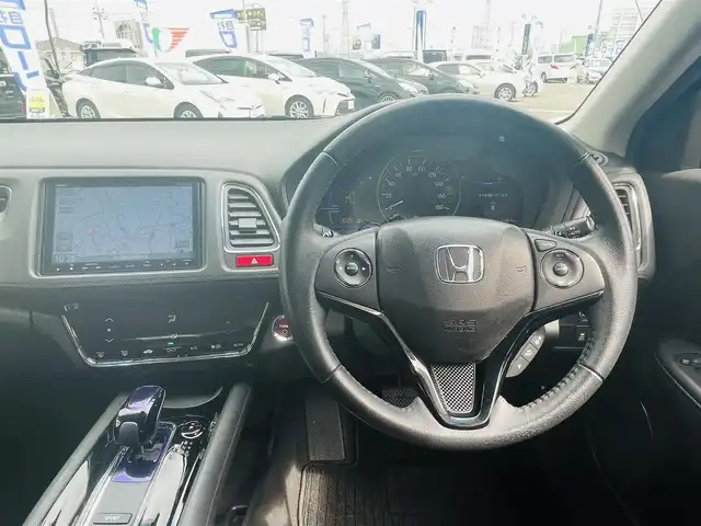 ホンダ ヴェゼル ハイブリッド X 岡山県 2014(平26)年 11.9万km クリスタルブラックパール (株)IDOMが運営する【じしゃロン岡山店】の自社ローン専用車両になります。こちらは現金またはオートローンご利用時の価格です。自社ローンご希望の方は別途その旨お申付け下さい/・純正ナビゲーション/・バックカメラ/・センシング/・ＥＴＣ