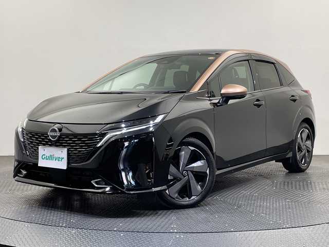 日産 オーラ G レザーエディション 愛媛県 2023(令5)年 2.1万km ミッドナイトブラック/サンライズカッパー ９型ナビ/フルセグ／Ｂｌｕｅｔｏｏｔｈ／ＵＳＢ/全方位カメラ/プロパイロット/衝突軽減ブレーキ/ＥＴＣ２．０/前方ドライブレコーダー/レーダークルーズコントロール/レーンキープアシスト/ブラインドスポットモニター/前後コーナーセンサー/オートマチックハイビーム/レザーシート/LEDヘッドライト