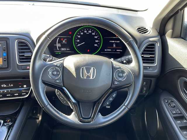 ホンダ ヴェゼル ハイブリッド Z ホンダセンシング 新潟県 2016(平28)年 7.1万km ホワイトオーキッドパール 純正メモリナビ/（DTV/DVD/Bluetooth）/バックカメラ/ホンダセンシング/衝突軽減/レーンキープアシスト/クルーズコントロール/ETC/革巻きステア/ステアリングスイッチ/パドルシフト/ハーフレザーシート/シートヒーター/フロアマット/LEDヘッドライト/フォグランプ/ウィンカーミラー/電格ミラー/ドアバイザー