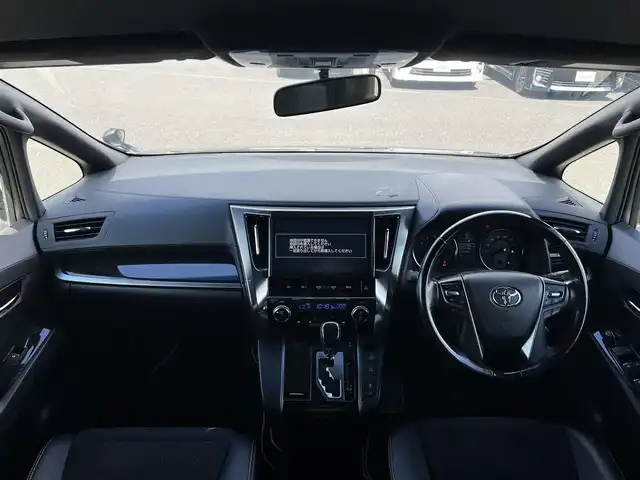 トヨタ ヴェルファイア 3.5ZA ゴールデンアイズ 道央・札幌 2016(平28)年 7.7万km グレーメタリック ４WD/純正SDナビ/AM/FM/BT/CD/DVD/フルセグ/純正フリップダウンモニター/衝突被害軽減ブレーキ/横滑り防止装置/レーダークルーズコントロール/クリアランスソナー/バックカメラ/ビルトインETC/ECOMODE/両側パワースライドドア/パワーバックドア/オットマン/ハーフレザーシート/革巻きウッドコンビステアリング/ステアリングリモコン/AC100V/電動パーキング/ブレーキホールド/MTモード付AT/プッシュスタート/スマートキー/LEDヘッドライト/オートライト/フォグランプ/電動格納ミラー/ウィンカーミラー/純正フロアマット/ドアバイザー