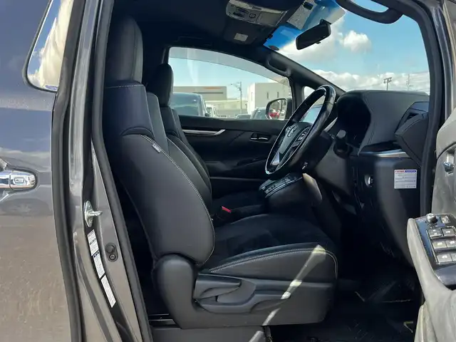 トヨタ ヴェルファイア 3.5ZA ゴールデンアイズ 道央・札幌 2016(平28)年 7.7万km グレーメタリック ４WD/純正SDナビ/AM/FM/BT/CD/DVD/フルセグ/純正フリップダウンモニター/衝突被害軽減ブレーキ/横滑り防止装置/レーダークルーズコントロール/クリアランスソナー/バックカメラ/ビルトインETC/ECOMODE/両側パワースライドドア/パワーバックドア/オットマン/ハーフレザーシート/革巻きウッドコンビステアリング/ステアリングリモコン/AC100V/電動パーキング/ブレーキホールド/MTモード付AT/プッシュスタート/スマートキー/LEDヘッドライト/オートライト/フォグランプ/電動格納ミラー/ウィンカーミラー/純正フロアマット/ドアバイザー