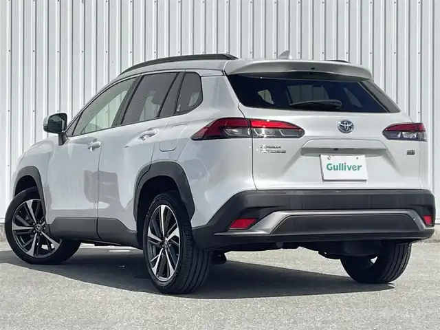トヨタ カローラ クロス ハイブリッド Z 福岡県 2021(令3)年 3.1万km プラチナホワイトパールマイカ 禁煙車/トヨタセーフティセンス/PCS/LTA/ＢＳＭ/クリアランスソナー/PKSB/RCTA/純正９インチディスプレイオーディオ/フルセグTV/BT/AM/FM/applecarplay/androidauto/Miracast/全周囲カメラ/ルーフレール/ハンズフリーパワーバックドア/レーダークルーズコントロール/ハーフレザーシート/D席パワーシート/D/Nシートヒーター/ＬＥＤオートライト/フォグランプ/オートハイビーム/ステアリングリモコン/ビルトインETC/スマートキー/プッシュスタート/純正AW/電格ミラー/オートエアコン