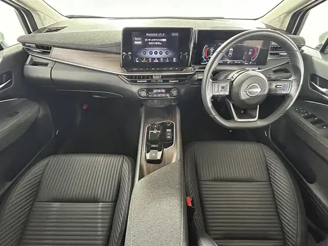 日産 オーラ G レザーエディション 佐賀県 2024(令6)年 1.1万km ピュアホワイトパール 純正９インチナビ/Apple CarPlay/HDMI/Bluetooth//フルセグTV/AM/FM/USB/アラウンドビューモニター/衝突軽減ブレーキ/車線逸脱警報/ブラインドスポットモニタリング/クリアランスソナー/レザーシート【本革】/パワーシート/デジタルインナーミラー/ビルトインＥＴＣ2.0/ＬＥＤヘッドライト/ISOFIX/社外フロアマット/純正17インチアルミホイール