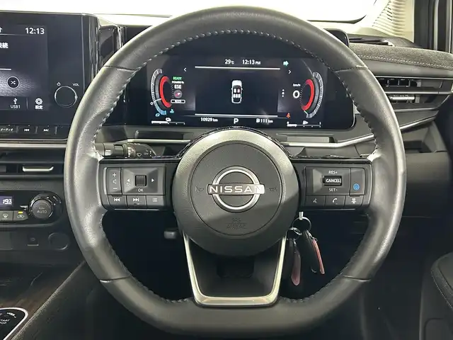 日産 オーラ G レザーエディション 佐賀県 2024(令6)年 1.1万km ピュアホワイトパール 純正９インチナビ/Apple CarPlay/HDMI/Bluetooth//フルセグTV/AM/FM/USB/アラウンドビューモニター/衝突軽減ブレーキ/車線逸脱警報/ブラインドスポットモニタリング/クリアランスソナー/レザーシート【本革】/パワーシート/デジタルインナーミラー/ビルトインＥＴＣ2.0/ＬＥＤヘッドライト/ISOFIX/社外フロアマット/純正17インチアルミホイール