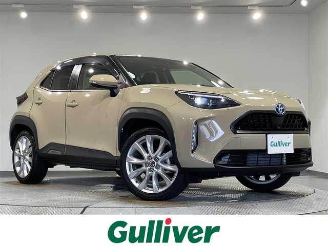 トヨタ ヤリスクロス ハイブリッド Z 愛知県 2023(令5)年 0.9万km ベージュ 純正８インチディスプレーナビ　/（AM/FM/Bluetooth/フルセグTV/Miracast/CarPlay)/ＡＣ１００Ｖ　/パノラミックビューモニター　/トヨタセーフティセンス　/　　-プリクラッシュセーフティ/　　-レーントレーニングアシスト＋レーンディパーチャーアラート/　　-レーダークルーズコントロール（ACC)/　　-オートマチックハイビーム/　　-ロードサインアシスト/　　-発進遅れ告知機能/ビルトインＥＴＣ２．０　/デジタルインナーミラー　/ブラインドスポットモニター　/シートヒーター　/ステアリングヒーター/D席パワーシート/LEDヘッドライト/USB接続/プッシュスタート/　　-スマートキー