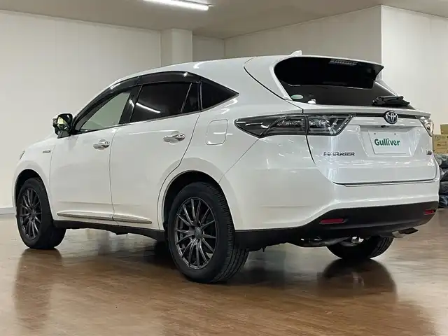 トヨタ ハリアー ハイブリッド エレガンス 道央・札幌 2014(平26)年 11.4万km ホワイトパールクリスタルシャイン 4WD/純正SDナビ/・フルセグTV/CD/DVD/BT/SD/USB/AUX/バックカメラ/社外エンジンスターター/本革シート/前席シートヒーター/前席パワーシート/運転席シートメモリ機能/ビルトインETC/プッシュスタート/スマートキー/スペアキー/緊急ブレーキシグナル/横滑り防止装置/純正フロアマット/純正ドアバイザー/ウインカーミラー/オートライト/LEDヘッドライト/前後フォグライト/社外18インチAW/純正AW付スタッドレスセット積込み/　（225/65R17  6mm）/新車時保証書/取扱説明書/ナビ取扱説明書