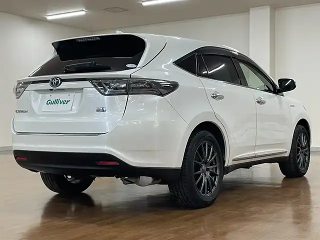 トヨタ ハリアー ハイブリッド エレガンス 道央・札幌 2014(平26)年 11.4万km ホワイトパールクリスタルシャイン 4WD/純正SDナビ/・フルセグTV/CD/DVD/BT/SD/USB/AUX/バックカメラ/社外エンジンスターター/本革シート/前席シートヒーター/前席パワーシート/運転席シートメモリ機能/ビルトインETC/プッシュスタート/スマートキー/スペアキー/緊急ブレーキシグナル/横滑り防止装置/純正フロアマット/純正ドアバイザー/ウインカーミラー/オートライト/LEDヘッドライト/前後フォグライト/社外18インチAW/純正AW付スタッドレスセット積込み/　（225/65R17  6mm）/新車時保証書/取扱説明書/ナビ取扱説明書