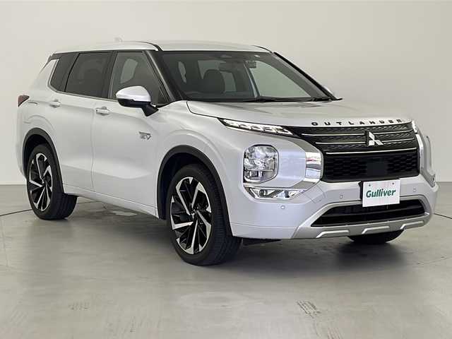 三菱 アウトランダー ＰＨＥＶ P 岐阜県 2022(令4)年 4.7万km ホワイトダイヤモンド ４WD/マルチアラウンドモニター/純正9インチナビ/フルセグTV/Bluetooth接続/ドライブレコーダー/レーダークルーズコントロール/レーンキープアシスト/コーナーセンサー/パドルシフト/パーキングセンサー/ふらつき警報/標識認識機能/横滑り防止装置/ステアリングリモコン/パドルシフト/パワーシート/シートメモリ/電格ミラー/BOSEプレミアムサウンド/全席シートヒーター