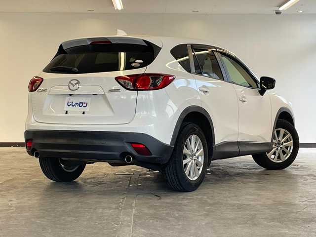 マツダ ＣＸ－５ 20S Lパッケージ 静岡県 2013(平25)年 9.6万km クリスタルホワイトパールマイカ (株)IDOMが運営する【じしゃロン浜松店】の自社ローン専用車両になりますこちらは現金またはオートローンご利用時の価格です。自社ローンご希望の方は別途その旨お申付け下さい/プッシュスタート/ドアバイザー/フルセグテレビ/AAC/横滑り防止装置/Bluetooth接続/ABS/AFS/ダブルエアバッグ/カーテンエアバッグ/盗難防止装置