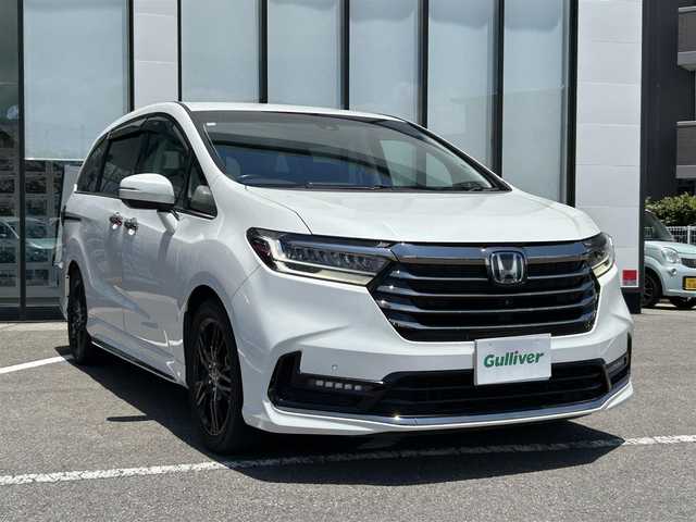 ホンダ オデッセイ ハイブリッド e:HEVアブソルート EX 長崎県 2020(令2)年 7.3万km パール 純正ナビ/純正フリップダウンモニター/マルチビューカメラシステム/ブラインドスポットインフォメーション/ハンズフリーアクセスパワーテールゲート/両側パワースライドドア/ワンオーナー/バックカメラ/前方位カメラ/プッシュスタート/ETC