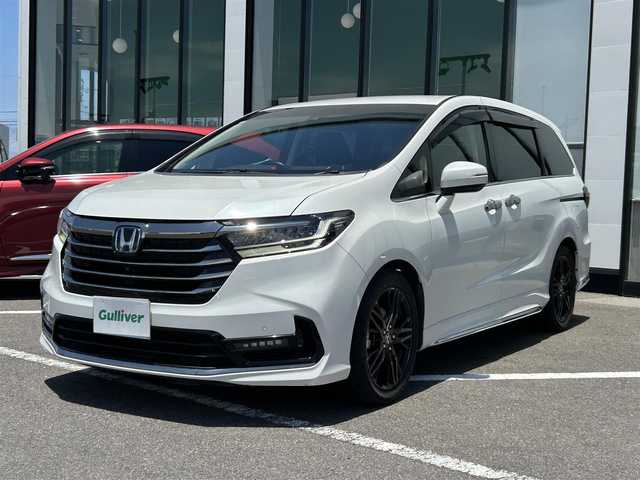 ホンダ オデッセイ ハイブリッド e:HEVアブソルート EX 長崎県 2020(令2)年 7.3万km パール 純正ナビ/純正フリップダウンモニター/マルチビューカメラシステム/ブラインドスポットインフォメーション/ハンズフリーアクセスパワーテールゲート/両側パワースライドドア/ワンオーナー/バックカメラ/前方位カメラ/プッシュスタート/ETC