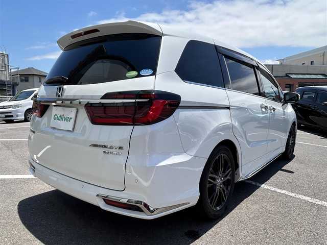 ホンダ オデッセイ ハイブリッド e:HEVアブソルート EX 長崎県 2020(令2)年 7.3万km パール 純正ナビ/純正フリップダウンモニター/マルチビューカメラシステム/ブラインドスポットインフォメーション/ハンズフリーアクセスパワーテールゲート/両側パワースライドドア/ワンオーナー/バックカメラ/前方位カメラ/プッシュスタート/ETC