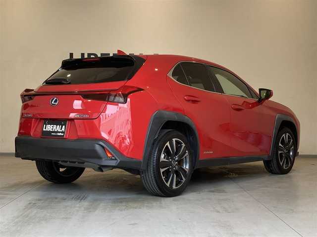 レクサス ＵＸ 250h バージョンL 熊本県 2021(令3)年 1.1万km マダーレッド ・スマートキー/・プッシュスタート/・プリクラッシュセーフティ/・レーントレーシングアラート/・ブラインドスポットモニター/・パーキングサポートアラート/・道路標識認識/・先行車発進告知/・オートマチックハイビーム/・クルーズコントロール(追従式)/・茶革シート/・前席パワーシート＆エアシート /・ハンドルヒーター /・純正メモリナビ/　【BD・Bluetooth・USB・SD・AUX・MSV】/・フルセグTV/・全方位カメラ/・ETC2.0/・ドライブレコーダー(前後録画)/・パワーバックドア/・LEDヘッドランプ/・LEDフォグランプ/・純正マット