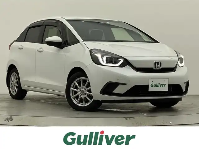 ホンダ フィット ホーム 宮城県 2020(令2)年 1.9万km プラチナホワイトパール 純正９型ナビ　/アダプティブクルーズコントロール　/衝突被害軽減ブレーキ　/レーンキープアシスト　/ＬＥＤヘッドライト　/パーキングセンサー　/誤発進抑制機能　/オートハイビーム/ドライブレコーダー　/ＥＴＣ　/バックモニター　/禁煙