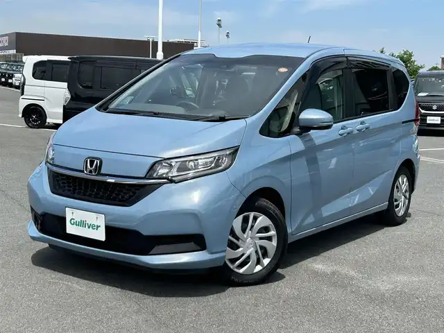 ホンダ フリード G ホンダセンシング 奈良県 2020(令2)年 6万km シーグラスブルーパール 純正ギャザーズナビ /フルセグTV /両側パワースライドドア /前方ドライブレコーダー /スマートキー /スペアキー /レーダークルーズコントロール /純正フロアマット /シートヒーター /コーナーセンサー /LEDヘッドライト/ETC/バックカメラ