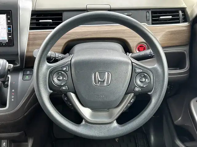 ホンダ フリード G ホンダセンシング 愛知県 2020(令2)年 6万km シーグラスブルーパール 禁煙車/純正7インチナビ/（CD/DVD/Bluetooth/ワンセグTV/SD)/バックカメラ/ホンダセンシング/・衝突軽減ブレーキ/・レーダークルーズコントロール/・レーンキープアシスト/ドライブレコーダー/ETC/シートヒーター/両側パワースライドドア/スマートキー/スペアキー有/プッシュスタート/純正フロアマット/横滑り防止装置/オートエアコン/オートライト
