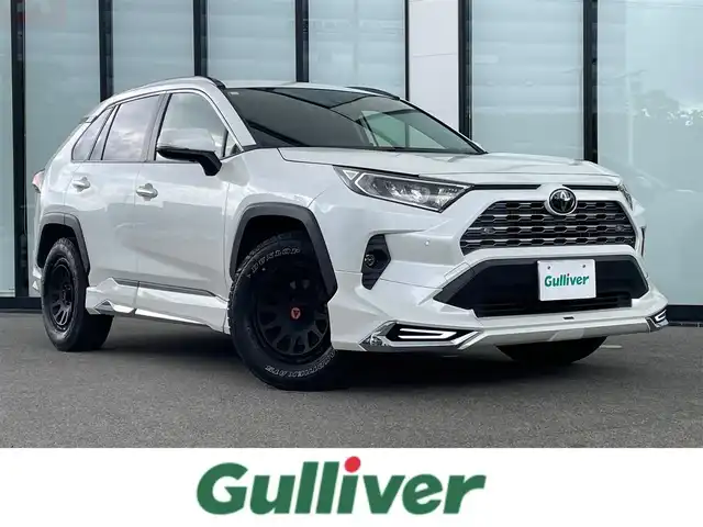 トヨタ ＲＡＶ４ G Zパッケージ 大阪府 2019(令1)年 8.4万km ホワイトパールクリスタルシャイン 純正９インチナビ/   フルセグTV/CD/DVD/Bluetooth/USB/衝突軽減ブレーキ/バックモニター/モデリスタエアロ　/ＤＥＬＴＡ／ＦＯＲＣＥアルミホイール/ブラインドスポットモニター/前後ドライブレコーダー/運転席メモリー付きパワーシート/前席シートヒーター/ステアリングヒーター/レーダークルーズコントロール/レーントレーシングアシスト/ダウンヒルアシストコントロール/100V電源/スマートルームミラー/オートマチックハイビーム/コーナーセンサー/ルーフレール/ＥＴＣ/ＬＥＤライト