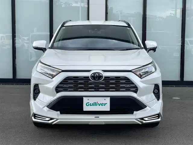 トヨタ ＲＡＶ４ G Zパッケージ 大阪府 2019(令1)年 8.4万km ホワイトパールクリスタルシャイン 純正９インチナビ/   フルセグTV/CD/DVD/Bluetooth/USB/衝突軽減ブレーキ/バックモニター/モデリスタエアロ　/ＤＥＬＴＡ／ＦＯＲＣＥアルミホイール/ブラインドスポットモニター/前後ドライブレコーダー/運転席メモリー付きパワーシート/前席シートヒーター/ステアリングヒーター/レーダークルーズコントロール/レーントレーシングアシスト/ダウンヒルアシストコントロール/100V電源/スマートルームミラー/オートマチックハイビーム/コーナーセンサー/ルーフレール/ＥＴＣ/ＬＥＤライト