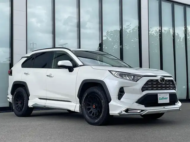 トヨタ ＲＡＶ４ G Zパッケージ 大阪府 2019(令1)年 8.4万km ホワイトパールクリスタルシャイン 純正９インチナビ/   フルセグTV/CD/DVD/Bluetooth/USB/衝突軽減ブレーキ/バックモニター/モデリスタエアロ　/ＤＥＬＴＡ／ＦＯＲＣＥアルミホイール/ブラインドスポットモニター/前後ドライブレコーダー/運転席メモリー付きパワーシート/前席シートヒーター/ステアリングヒーター/レーダークルーズコントロール/レーントレーシングアシスト/ダウンヒルアシストコントロール/100V電源/スマートルームミラー/オートマチックハイビーム/コーナーセンサー/ルーフレール/ＥＴＣ/ＬＥＤライト