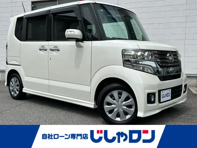 ホンダ Ｎ ＢＯＸ カスタム G 三重県 2014(平26)年 7.1万km プレミアムホワイトパール (株)IDOMが運営する【じしゃロン四日市店】の自社ローン専用車両になります。こちらは現金またはオートローンご利用時の価格です。自社ローンご希望の方は別途その旨お申付け下さい/社外SDナビ（CD/DVD/AM/FM）/エンジンスタートボタン/スマートキー/片側パワースライド/キセノンライト/ベンチシート