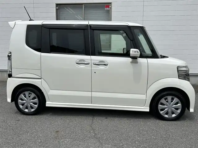 ホンダ Ｎ ＢＯＸ カスタム G 三重県 2014(平26)年 7.1万km プレミアムホワイトパール (株)IDOMが運営する【じしゃロン四日市店】の自社ローン専用車両になります。こちらは現金またはオートローンご利用時の価格です。自社ローンご希望の方は別途その旨お申付け下さい/社外SDナビ（CD/DVD/AM/FM）/エンジンスタートボタン/スマートキー/片側パワースライド/キセノンライト/ベンチシート