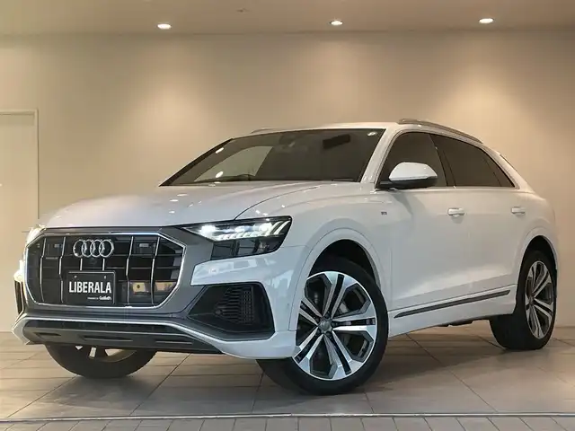 アウディ Ｑ８ 55TFSIクワトロ デビューPKG Sライン 愛知県 2019(令1)年 3.8万km グレイシアホワイトメタリック コンフォートアシスタンスＰＫG/・HDマトリクスLEDヘッドライト/・LEDリヤダイナミックターンインディケーター/・オールホイールステアリング/・ルーフレール（アルミニウム）/・アダプティブウインドウワイパー/・パワークロージングドア/・フロントクロストラフィックアシスト/・アウディサイドアシスト/・エグジットワーニング/・リヤクロストラフィックアシスト/・アウディプレセンスフロント/リヤ/・アダプティブドライブアシスト/エマージェンシーアシスト/・プレセンスベーシック（リヤシート）/リヤサイドエアバッグ/・アウディプレセンス360/・S line エクステリア/・アルミホイール 5ツインアームデザインコントラストグレー/・アダプティブエアサスペンション スポーツ/・スポーツシート（フロント）/・アルカンターラ/レザー/・ドアシルトリム S lineロゴ/・4ゾーン デラックスオートマチックエアコンディショナー/・Bang & Olufsen 3D サウンドシステム（17スピーカー）/・MMIナビゲーション/・TVチューナー/・Bluetooth/・ドライブレコーダー/・ETC２．０