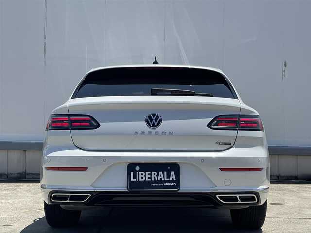 フォルクスワーゲン ＶＷ アルテオン TSI 4モーション Rライン 東京都 2022(令4)年 3.8万km オリックスホワイトマザーオブパールエフェクト 純正ナビ/フルセグTV/Bluetooth接続/360°カメラ/オールインセーフティ(予防安全装備)/LEDヘッドランプ/「R」エンブレム入クローム横5本バーフロントグリル/フロントエアロバンパー/ボディ同色ドアミラー(電動格納機能/ヒーター/運転席自動防眩機能/助手席リバース連動機能付/メモリー機能無し)/リアスポイラー/デュアルツインマフラーカッター組込下部ブラックリアバンパー/アルミニウムコラティブインパネ加飾/255/40R19タイヤ/19インチ5本ツインスポークアルミホイール/「R」ロゴ入ディンプル革巻きステアリングホイール(ステアリングヒーター無し)/デジタルコックピットプロ(フルデジタルメーター)/ヘッドアップディスプレイ/「R」ロゴ入りマイクロフリースシート/トップコンフォートシート(前席)/パワーシート/シートヒーター(D席/N席)/パワーバックドア