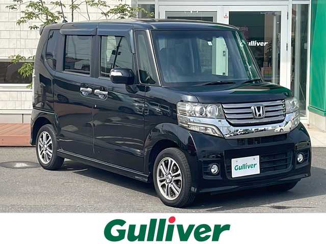 ホンダ Ｎ ＢＯＸ カスタム SSパッケージ 青森県 2015(平27)年 10.4万km スマートブラック 4WD/純正メモリナビ・ワンセグTV/CD・DVD・Bluetooth・SD/バックカメラ/両側パワースライドドア/前席シートヒーター/あんしんパッケージ/衝突軽減ブレーキ/サイド・カーテンエアバッグ/ETC/HIDヘッドライト/フォグランプ/純正14インチアルミホイール/スマートキー/プッシュスタート
