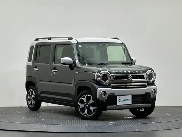 スズキ ハスラー Jスタイル Ⅱ 愛媛県 2024(令6)年 0.6万km クールカーキパールメタリック/ソフトベージュメタリック 純正９インチメモリーナビ　アラウンドビューモニター　追従型クルーズコントロール　前席シートヒーター　フルセグＴＶ　フロアマット　純正アルミホイール　コーナーセンサー　オートライト