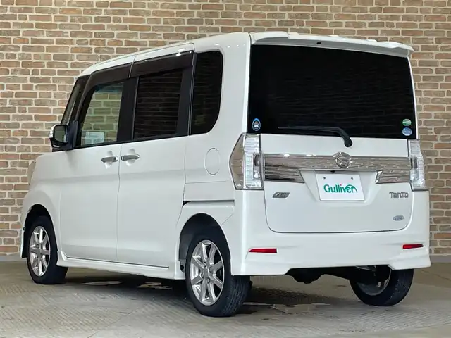 ダイハツ タント カスタム X トップED SA 岩手県 2015(平27)年 6.4万km パールホワイトⅢ ４WD/社外ナビ（Bluetooth CD DVD USB フルセグ）/衝突被害軽減ブレーキ/片側パワースライドドア/スマートアシスト/バックカメラ/アイドリングストップ/誤発進抑制機能/ステアリングスイッチ/LEDヘッドライト/横滑り防止装置/純正１４インチアルミホイール/フォグランプ/オートエアコン/オートライト/ロールサンシェード/ベンチシート/ドアミラーウインカー