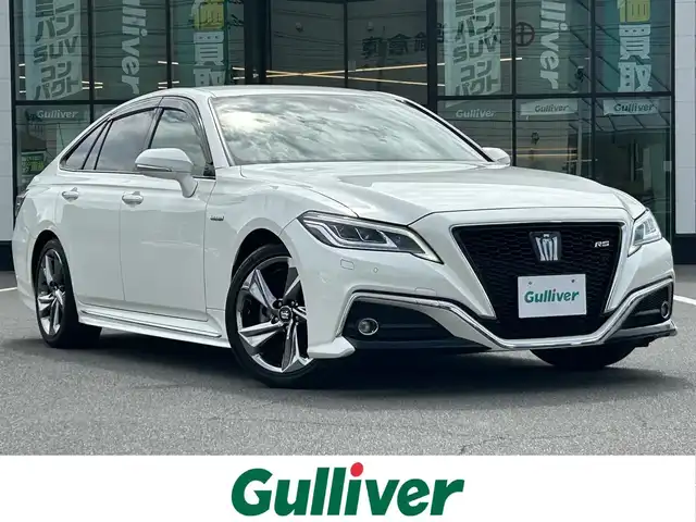 トヨタ クラウン ハイブリッド RS 岡山県 2018(平30)年 8.4万km ホワイトパールクリスタルシャイン 登録時走行距離83811km/純正ナビ/フルセグTV(AM.FM.CD.DVD.TV.BT)/バックカメラ/ETC2.0/ブラインドスポットモニター/ドライブレコーダー/シートヒーター/ステアリングヒーター/クリアランスソナー/衝突軽減ブレーキ/横滑り防止装置/レーダークルーズコントロール/レーンキープアシスト/オートライト/オートマチックハイビーム/アイドリングストップ/18インチ純正AW/純正フロアマット/D+N席パワーシート