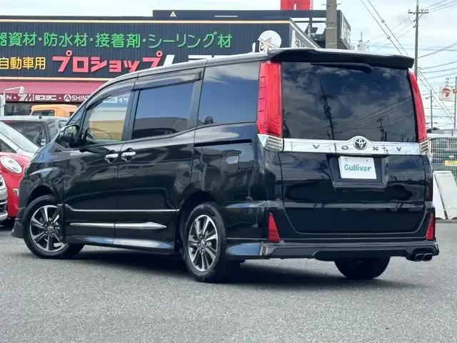 トヨタ ヴォクシー ZS 煌 愛知県 2018(平30)年 6.4万km ブラック /ワンオーナー//モデリスタエアロ（フロント、サイド、リア）//モデリスタマフラー//純正16AW//アルパイン11インチナビ//CD/DVD/BT/MSV/フルセグ/HDMI//バックカメラ//アルパイン12.8インチフリップダウンモニター//両側パワースライドドア//ETC//PCS/LDA//先行車発進告知//クルーズコントロール//アイドリングストップ//LEDオートライト//オートマチックハイビーム//LEDフォグランプ//LEDルームランプ//オートリトラウィンカーミラー//MTモード付AT//本革巻きステアリング//ステアリングスイッチ//後席ロールサンシェード//三列シート//ウォークスルー//純正フロアマット//純正ドアバイザー//スペアスマートキー//新車時保証書//取扱説明書