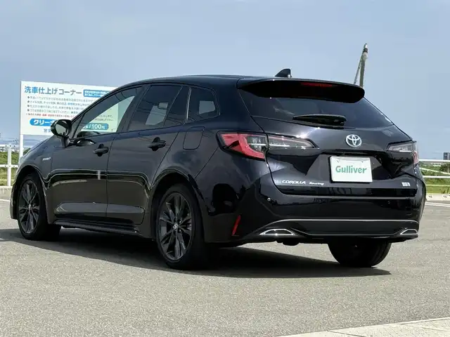 トヨタ カローラツーリング ハイブリッド ダブルバイビー 佐賀県 2019(令1)年 3.7万km スパークリングブラックパールクリスタルシャイン 純正9型ディスプレイオーディオ/・AM/FM/CD/DVD/フルセグ//・Appple Car Play/Android Auto//・ナビ機能付き/・バックカメラ/黒ハーフレザーシート/スマートキー/LEDヘッドライト/・オートマチックハイビーム/電動パーキングブレーキ/・オートホールド機能/純正17インチアルミホイール/USB入力端子/新車保証書/取扱説明書/トヨタセーフティーセンス/・プリクラッシュセーフティ/・レーンディパーチャーアラート（ステアリング制御機能付）/・レーントレーシングアシスト/・レーダークルーズコントロール（全車速追従機能付）/・ロードサインアシスト/・インテリジェントクリアランスソナー/・リヤクロストラフィックオートブレーキ/・盗難防止システム/・VSC/・ヒルスタートアシストコントロール/・パーキングサポートブレーキ