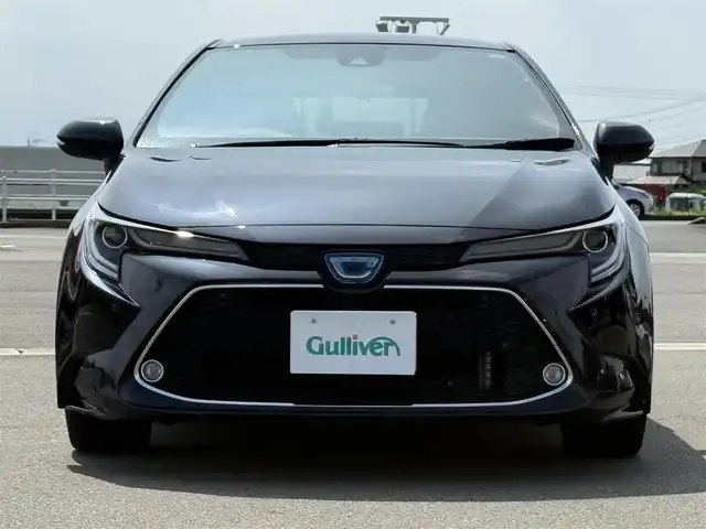 トヨタ カローラツーリング ハイブリッド ダブルバイビー 佐賀県 2019(令1)年 3.7万km スパークリングブラックパールクリスタルシャイン 純正9型ディスプレイオーディオ/・AM/FM/CD/DVD/フルセグ//・Appple Car Play/Android Auto//・ナビ機能付き/・バックカメラ/黒ハーフレザーシート/スマートキー/LEDヘッドライト/・オートマチックハイビーム/電動パーキングブレーキ/・オートホールド機能/純正17インチアルミホイール/USB入力端子/新車保証書/取扱説明書/トヨタセーフティーセンス/・プリクラッシュセーフティ/・レーンディパーチャーアラート（ステアリング制御機能付）/・レーントレーシングアシスト/・レーダークルーズコントロール（全車速追従機能付）/・ロードサインアシスト/・インテリジェントクリアランスソナー/・リヤクロストラフィックオートブレーキ/・盗難防止システム/・VSC/・ヒルスタートアシストコントロール/・パーキングサポートブレーキ