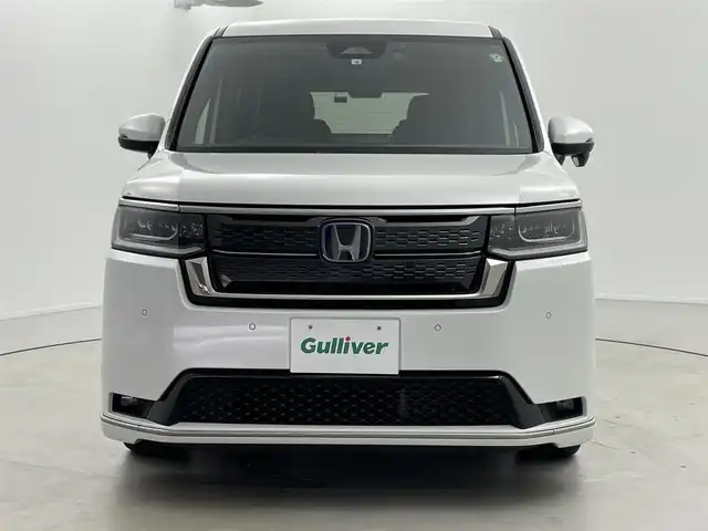 ホンダ ステップワゴン スパーダ eHEV 福井県 2022(令4)年 6.4万km プラチナホワイトパール ワンオーナー/純正11.4インチデイスプレイナビ/【AM/FM/CD/DVD/Bluetooth/フルセグTV】/バックカメラ/ETC/両側パワースライドドア/ホンダセンシング/・衝突軽減ブレーキ/・車線逸脱警報機能/・クルーズコントロール（追従有）/・レーンキープアシスト/電動リアゲート/ドライブレコーダー（前後）/ハーフレザーシート/シートヒーター（運転席/助手席）/オートライト/LEDヘッドライド/プッシュスタート/スマートキー