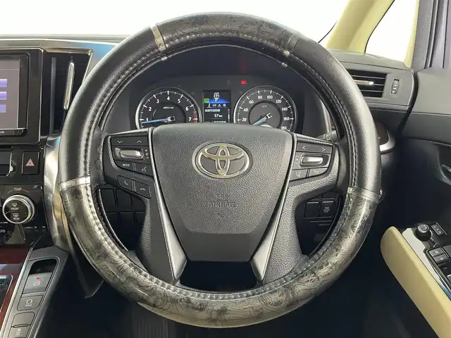 トヨタ アルファード X 大分県 2015(平27)年 7.7万km ホワイトパールクリスタルシャイン 純正SDナビ/(フルセグ/CD/DVD/BT)/片側パワースライドドア/バックカメラ/ビルトインETC/前方ドライブレコーダー/オートライト/電動パーキングブレーキ/ステアリングスイッチ/アイドリングストップ/スマートキー/プッシュスタート/スペアキー/MTモード付きAT