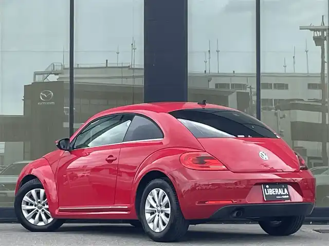 フォルクスワーゲン ザ・ビートル デザイン 石川県 2015(平27)年 4.9万km 赤 純正ナビ/（Bluetooth/TV）/バックカメラ/MTモード付AT/ETC/プッシュスタート/フロアマット/純正アルミホイール/スペアキー×１