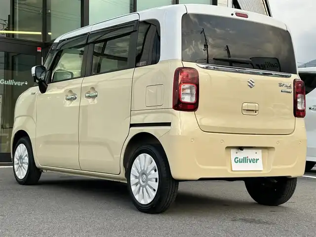 スズキ ワゴンＲ スマイル HYBRID X 愛媛県 2022(令4)年 0.8万km シフォンアイボリーメタリック 社外7インチナビ/CD/DVD/Bluetooth/フルセグTV/USB/バックカメラ/両側パワースライドドア/スズキセーフティサポート/デュアルカメラブレーキサポート/車線逸脱警報/前後誤発進抑制機能/ふらつき警報/先行車発進お知らせ機能/シートヒーター/オートライト/LEDヘッドライト/フロントフォグ/ETC/プッシュスタート