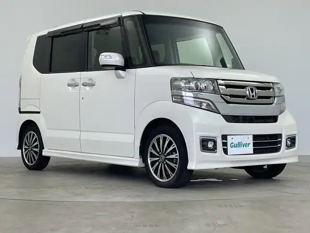 ホンダ Ｎ ＢＯＸ カスタム G ターボ Lパッケージ 鹿児島県 2016(平28)年 4.3万km プレミアムホワイトパールⅡ 社外SDナビ/（AM/FM/CD/DVD/Bluetooth/フルセグ）/バックカメラ/クルーズコントロール/パドルシフト/両側パワースライドドア /スマートキー /ETC/AAC/純正15インチAW/純正ドアバイザー/ドアバイザー/LEDヘッドライト/リアサンシェード