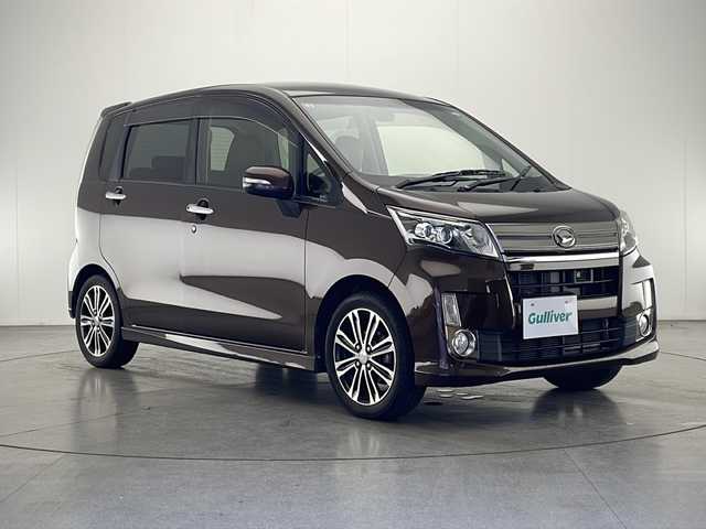 ダイハツ ムーヴ カスタム X VSスマートセレSA 宮崎県 2014(平26)年 6.5万km プラムブラウンクリスタルマイカ 禁煙車/衝突被害軽減ブレーキ/社外ナビTV/（ストラーダ/CN-R500WD/CD/DVD/Bluetooth/フルセグTV)/社外clazzioシートカバー/社外ETC/純正15インチアルミ/純正エアロ/純正キセノンオートライト/純正フォグ/純正フロアマット/エコアイドル/オートエアコン/ウインカードアミラー/電動格納ミラー/本革巻ハンドル/スマートキー/プッシュエンジンスタート/スペアキー/取扱い説明書