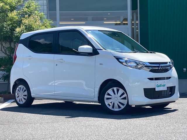 三菱 ｅＫワゴン M 愛媛県 2024(令6)年 0.3万km ホワイト 禁煙車 /純正9インチナビ(MM223D-LM) /・フルセグTV/Bluetooth/SD /バックカメラ /安全装置/・衝突軽減ブレーキ /・車線逸脱警報 /・先行車発信お知らせ /・速度/道路標識認識機能 /・コーナーセンサー /・ふらつき警報/リモコンキー/・スペアキー/アイドリングストップ/前座席シートヒーター /取扱説明書