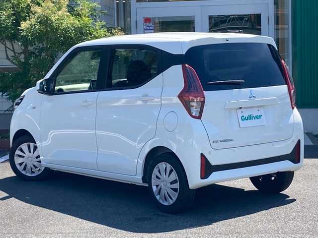 三菱 ｅＫワゴン M 愛媛県 2024(令6)年 0.3万km ホワイト 禁煙車 /純正9インチナビ(MM223D-LM) /・フルセグTV/Bluetooth/SD /バックカメラ /安全装置/・衝突軽減ブレーキ /・車線逸脱警報 /・先行車発信お知らせ /・速度/道路標識認識機能 /・コーナーセンサー /・ふらつき警報/リモコンキー/・スペアキー/アイドリングストップ/前座席シートヒーター /取扱説明書