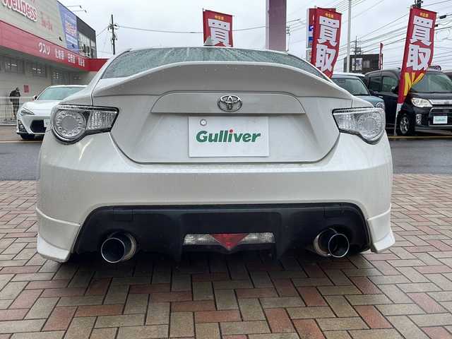 トヨタ ８６ GT 鳥取県 2012(平24)年 7.9万km サテンホワイトパール モデリスタエアロ/アドバン18インチAW/柿本改マフラー/社外ディスプレイオーディオ/社外ヘッドライト/社外テールライト（純正あり）/社外リップスポイラー/社外ステアリング/社外インテリアパネル/アペックス車高調（積込）/ボンネットラッピング